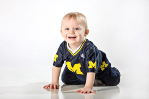 Cute little boy in Michigan jersey