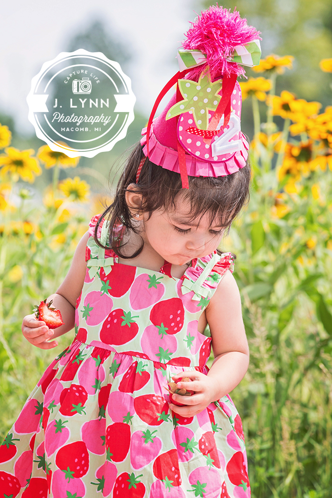Little girl in sunflowers