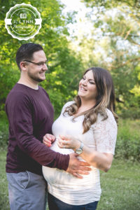 pregnant wife with husband laughing