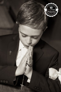 praying with rosary at church