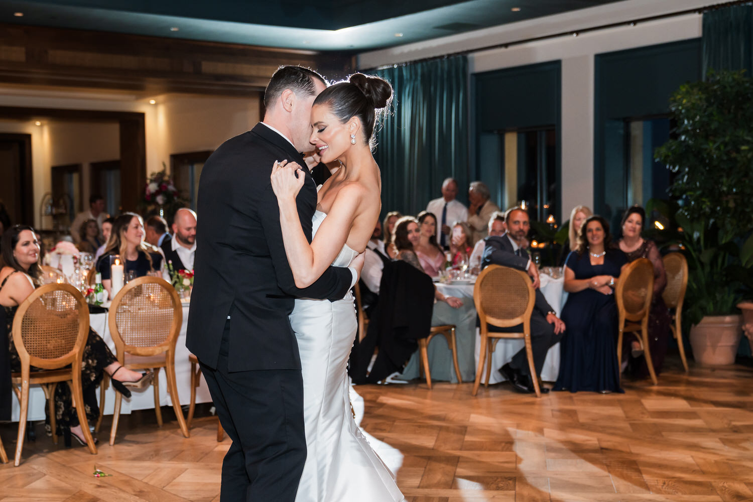 Bride and groom sharing their first dance during an elegant Book Tower wedding reception in Detroit.